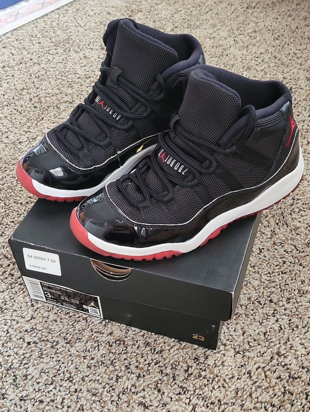 Jordan 11 Kids Black and Red Retro High-Top Sneakers Size 3Y